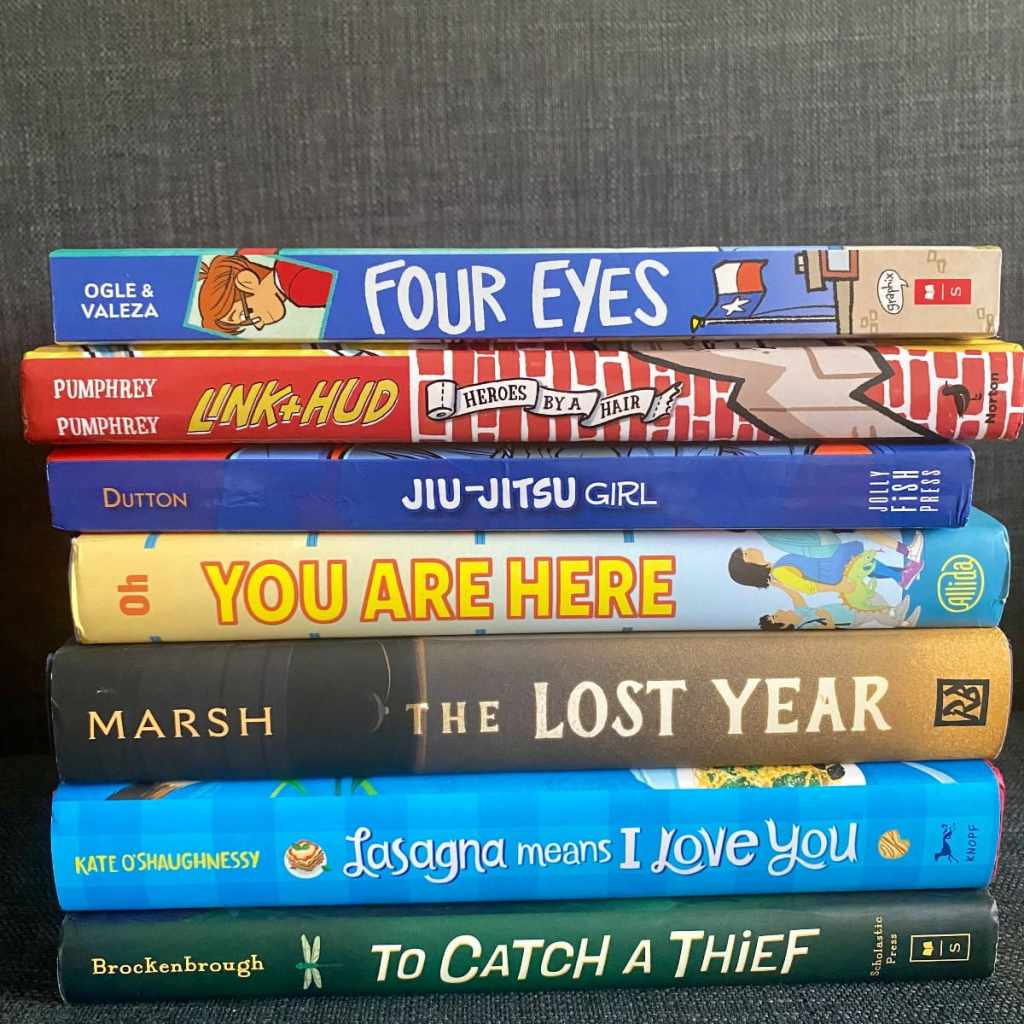 a stack of 2023 middle grade books
