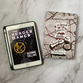 two of the best book series for teens including a good girl's guide to murder and hunger games