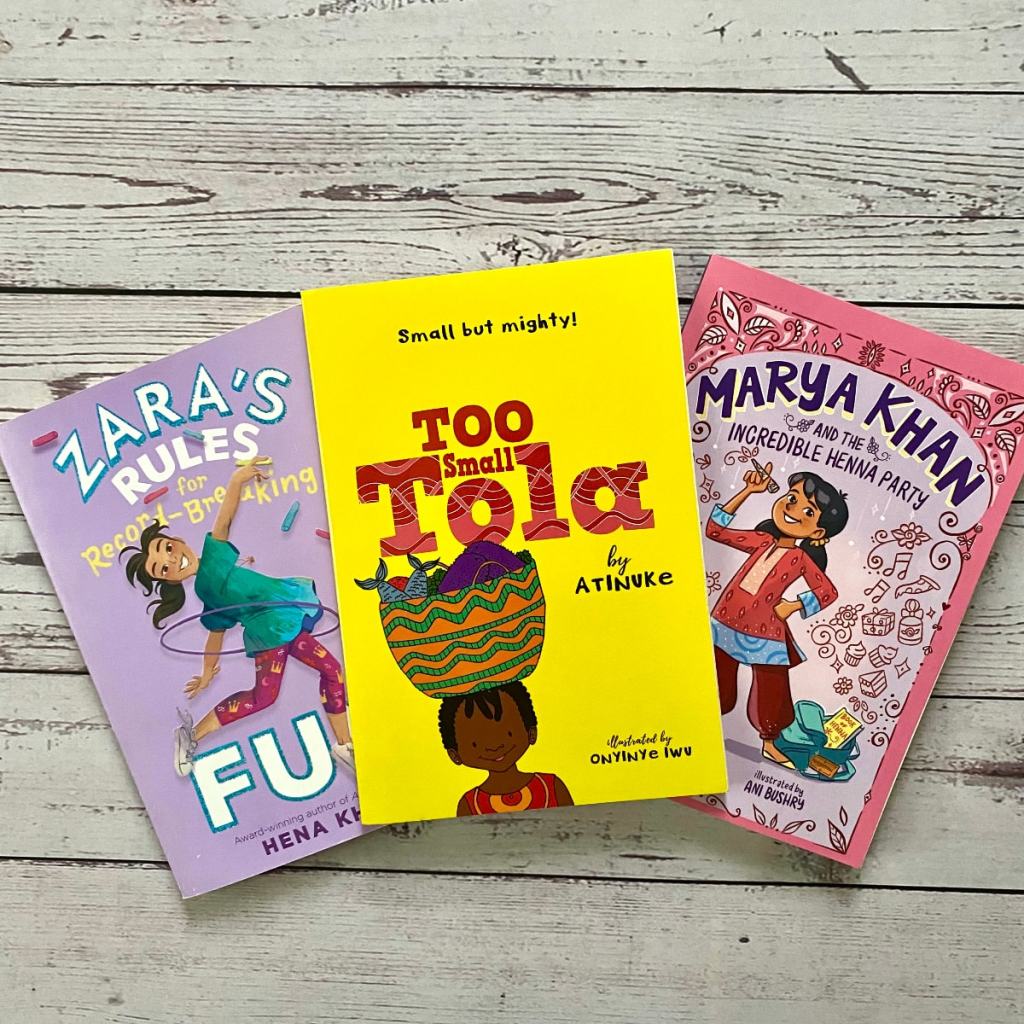 a selection of three books for 8 year olds on a white wood background