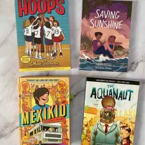 a selection of graphic novels for 11 year olds