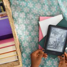 kindle and book basket flat lay