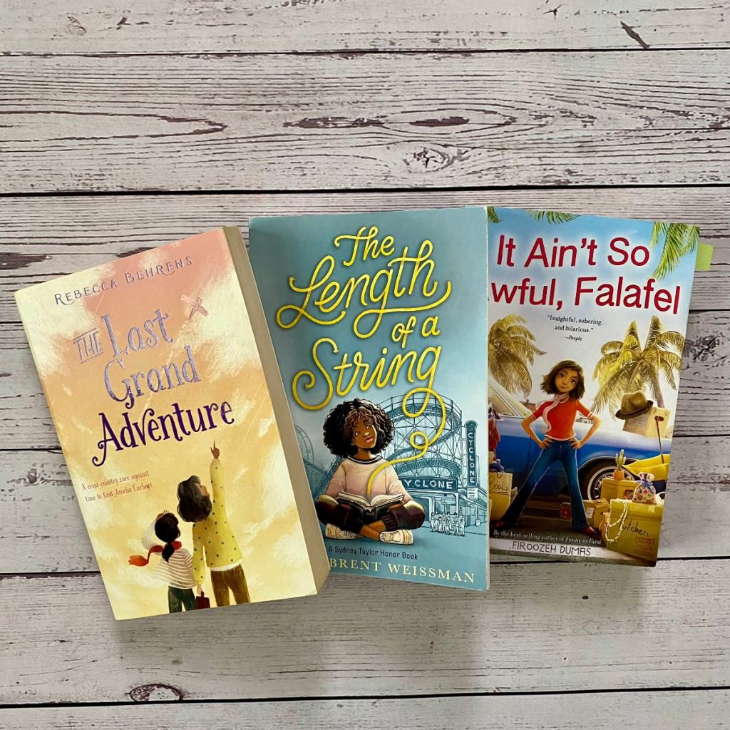 three middle grade historical fiction books stacked against each other