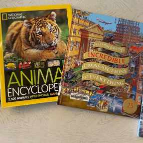 two nonfiction books for 6th graders including cross sections of everything and national geographic books