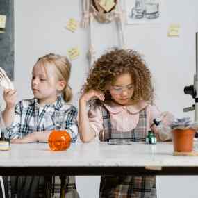 students experimenting using laboratory equipment inside the laboratory