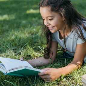 white girl reading - gifts for kids who love to read