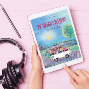 a tablet shows the book the vanderbeekers on the road with headphones on the side